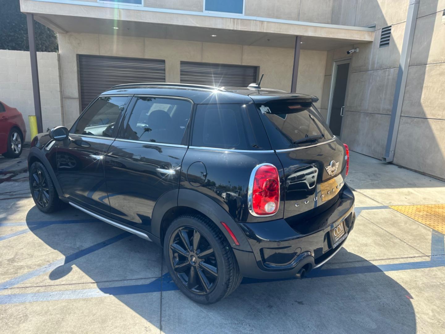 2015 Black /Black Mini Countryman S (WMWZC3C54FW) with an 1.6L L4 DOHC 16V TURBO engine, Automatic transmission, located at 30 S. Berkeley Avenue, Pasadena, CA, 91107, (626) 248-7567, 34.145447, -118.109398 - Photo#3